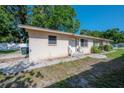A cozy single-story residence showcases a simple design and functional outdoor space at 725 2Nd Ne Ave, Largo, FL 33770