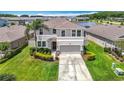 Beautiful home with a well-kept lawn in a suburban community and scenic view at 1022 Montgomery Bell Rd, Wesley Chapel, FL 33543
