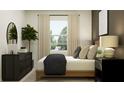 Comfortable bedroom with a neutral palette, a view to the outdoors, and modern accents at 14974 Topaz Blue St, Wimauma, FL 33598