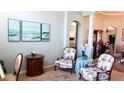 Comfortable living room with an open design, leading to other areas of the home at 16515 Nikki Ln, Odessa, FL 33556