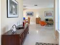 Cozy living room featuring stylish decor, modern furnishings, and ample natural light at 1775 62Nd S Ter, St Petersburg, FL 33712