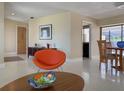 Bright and airy living room boasts an open floor plan and a seamless flow to other rooms at 1775 62Nd S Ter, St Petersburg, FL 33712