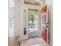 Welcoming entryway featuring tile flooring and a glimpse of the outdoor scenery at 10536 Shady Preserve Dr, Riverview, FL 33579