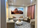Elegant living room with stylish seating and eye-catching decor, perfect for entertaining at 10826 Rain Lilly Pass, Land O Lakes, FL 34638