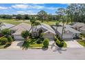 Beautiful neighborhood homes with well-manicured lawns and close proximity to golf course at 1130 Hominy Hill Dr, Trinity, FL 34655
