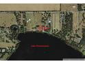 Aerial view of lakefront property on Lake Thonotosassa, with access to Knights Griffin Road at 11337 Knights Griffin Rd, Thonotosassa, FL 33592