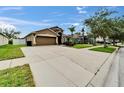 A well-kept single-Gathering house featuring a two-car garage and a spacious driveway at 2330 Lawrence Hall St, Ruskin, FL 33570