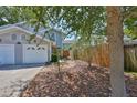 Charming two-story home with a two car garage and beautiful rock and bark landscaping at 3053 S Concordia Ave # A, Tampa, FL 33629
