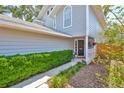 Inviting front entrance with a well maintained landscape design at 3053 S Concordia Ave # A, Tampa, FL 33629