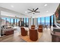 Relax in this comfortable living room with large windows and panoramic water views at 1 Beach Se Dr # 1902, St Petersburg, FL 33701