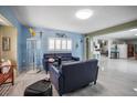 Bright living room with tile flooring and neutral decor at 2174 62Nd N St, Clearwater, FL 33760