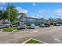 Spacious parking lot serving a residential building with plenty of space for residents and visitors at 4325 58Th N Way # 1527, Kenneth City, FL 33709