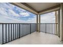 Condo balcony view showing water and city landscape in the distance at 6322 Palma Del Mar S Blvd # 1107, St Petersburg, FL 33715