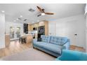 Bright open-plan living room with a modern kitchen and stylish decor at 1851 Oklahoma Ne Ave, St Petersburg, FL 33703