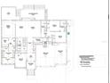 Detailed floor plan showcasing the layout of this spacious home, including bedrooms, kitchen, and garage at 17282 Carroway Ln, Punta Gorda, FL 33955