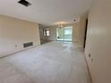 Spacious living room with ample natural light and potential for customization at 3035 Coldwell Dr, Holiday, FL 34691