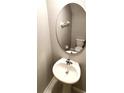 This bathroom features a modern sink with faucet, vanity and toilet at 4505 Globe Thistle Dr, Tampa, FL 33619