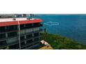 Condo balcony overlooking pristine bay waters and stunning ocean view at 2700 Bayshore Blvd # 11405, Dunedin, FL 34698