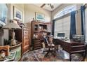 Comfortable office space with traditional furniture, large window and ample room for work at 3402 Stonebridge Trl, Valrico, FL 33596