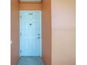 Unit 203B featuring a standard front door with security features at 6960 20Th N Ave # 203B, St Petersburg, FL 33710