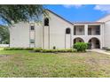 Charming condo featuring well-maintained landscaping, architectural details including arched entries and trim at 9700 Starkey Rd # 312, Seminole, FL 33777