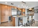 Gourmet kitchen with granite countertops, stainless steel appliances, and a center island with seating at 1120 E Kennedy Blvd # 1512, Tampa, FL 33602