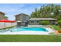 Inviting backyard pool with ample space for entertaining and relaxation at 4204 Northwind Ln, Tampa, FL 33624