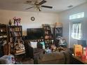 Cozy living room with natural light featuring a ceiling fan and an open layout at 7187 53Rd N St, Pinellas Park, FL 33781