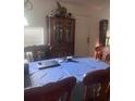 Cozy dining room with wood furniture and natural light at 18063 Parrot Rd, Weeki Wachee, FL 34614