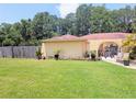 Lovely single-story home with a well-manicured front lawn and inviting curb appeal at 7535 Cypress Knoll Dr, New Port Richey, FL 34653