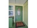 Beautiful front door with decorative glass and a secure locking system at 250 Rosery Nw Rd # 218, Largo, FL 33770