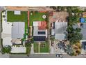 An aerial view of the property showing the lawn, solar panels and layout of the area at 6183 5Th S Ave, St Petersburg, FL 33707