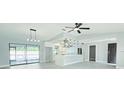Bright, open-concept kitchen featuring modern appliances, a stylish island, and a view of the pool at 1178 Sultana St, Port Charlotte, FL 33952