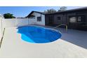 Inviting backyard pool with a screened-in lanai at 1178 Sultana St, Port Charlotte, FL 33952