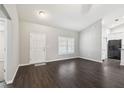 Well-lit living room showcasing modern floors and a bright, airy atmosphere at 13227 Quigley Ave, Weeki Wachee, FL 34614