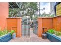 Welcome guests through a wrought iron gate into this urban oasis at 215 Central Ave # 2B, St Petersburg, FL 33701