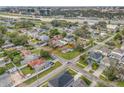Aerial view of a residential area with cozy houses, tree-lined streets, and a desirable neighborhood feel at 4001 W Carmen St # 1/2, Tampa, FL 33609