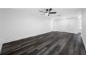 Bright living room boasts modern flooring and ample space for living and entertaining at 5109 Horton Rd, Plant City, FL 33567
