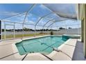 Screened-in pool and spa, perfect for outdoor relaxation and entertainment at 6425 Clair Shore Dr, Apollo Beach, FL 33572
