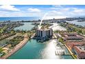 High-rise condo with stunning water views, pool and boat docks provide an upscale coastal lifestyle at 10355 Paradise Blvd # 1003, Treasure Island, FL 33706