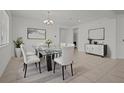 Elegant dining room with a glass table, chandelier, and neutral decor at 12697 Achasta Blvd, Hudson, FL 34669