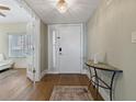 Inviting foyer with hardwood floors, elegant decor, and a glimpse into the bright living area at 1586 Gulf Blvd # 2502, Clearwater, FL 33767