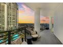 Private balcony with comfortable seating offering panoramic city and water views at 449 S 12Th St # 1201, Tampa, FL 33602