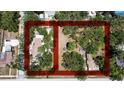 Birds-eye view of the property with lots of mature trees at 5680 77Th N Ave, Pinellas Park, FL 33781
