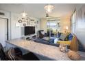 Cozy living room with stylish decor, comfortable seating, and views of the water at 5701 Bahia Del Mar Cir # 108, St Petersburg, FL 33715