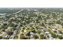 Enjoy an aerial view of the property's surroundings, showcasing neighborhood and nearby amenities at 6573 20Th N St, St Petersburg, FL 33702