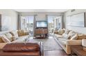 Cozy living room with access to a private balcony at 10216 Regal Dr # 409, Largo, FL 33774