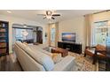 Comfortable living room boasts ample seating, natural light, and seamless flow into the dining area at 2519 1St N Ave, St Petersburg, FL 33713