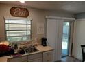A cozy kitchen space, ready for cooking and memories at 7317 Mitchell Ranch Rd, New Port Richey, FL 34655