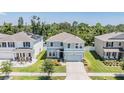 Beautiful two-story home with manicured lawn in a serene neighborhood setting at 8208 Praise Dr, Tampa, FL 33625